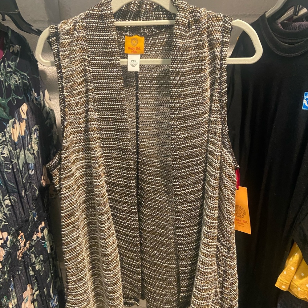 Adorable open sweater vest